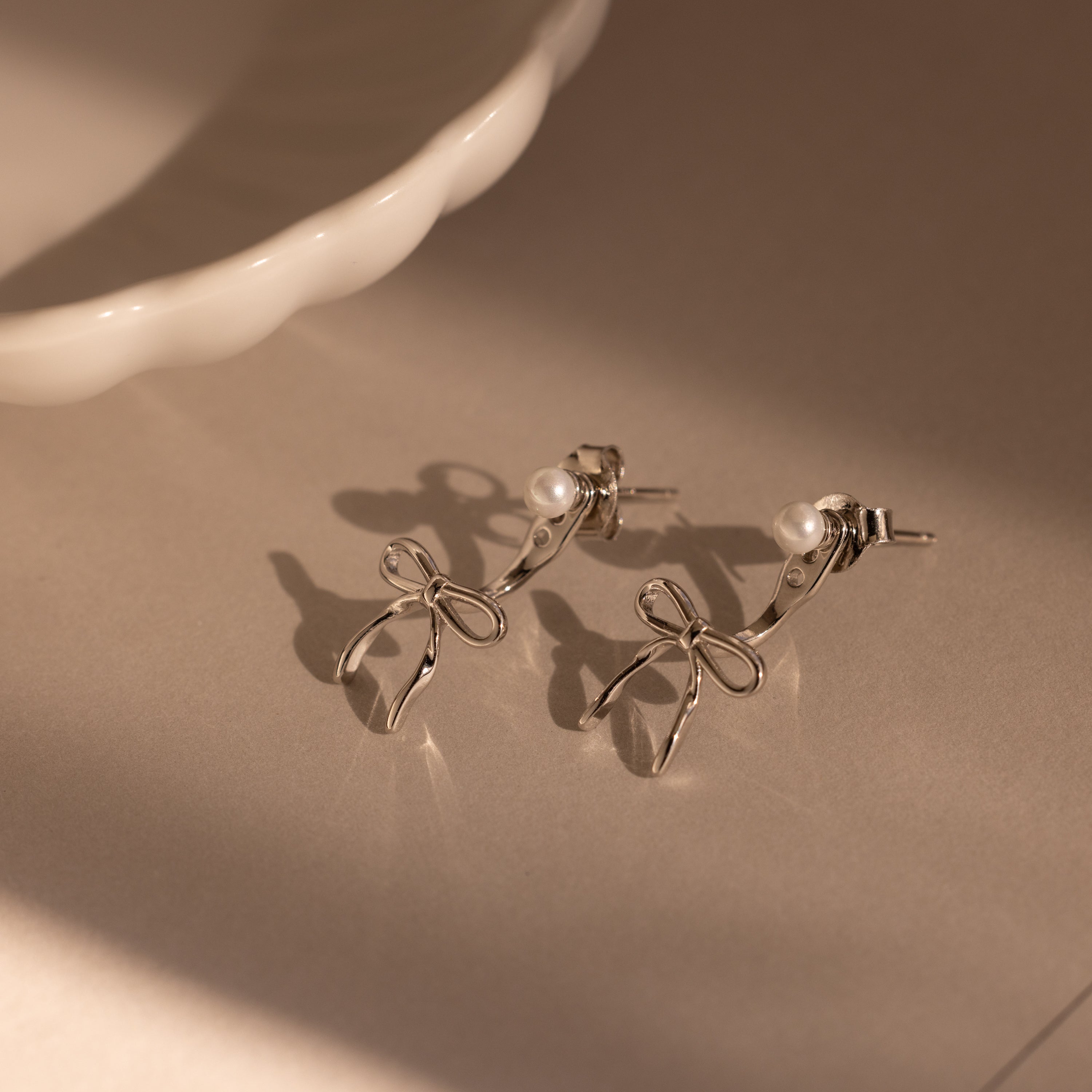 Pearl & Bow Ear Jackets
