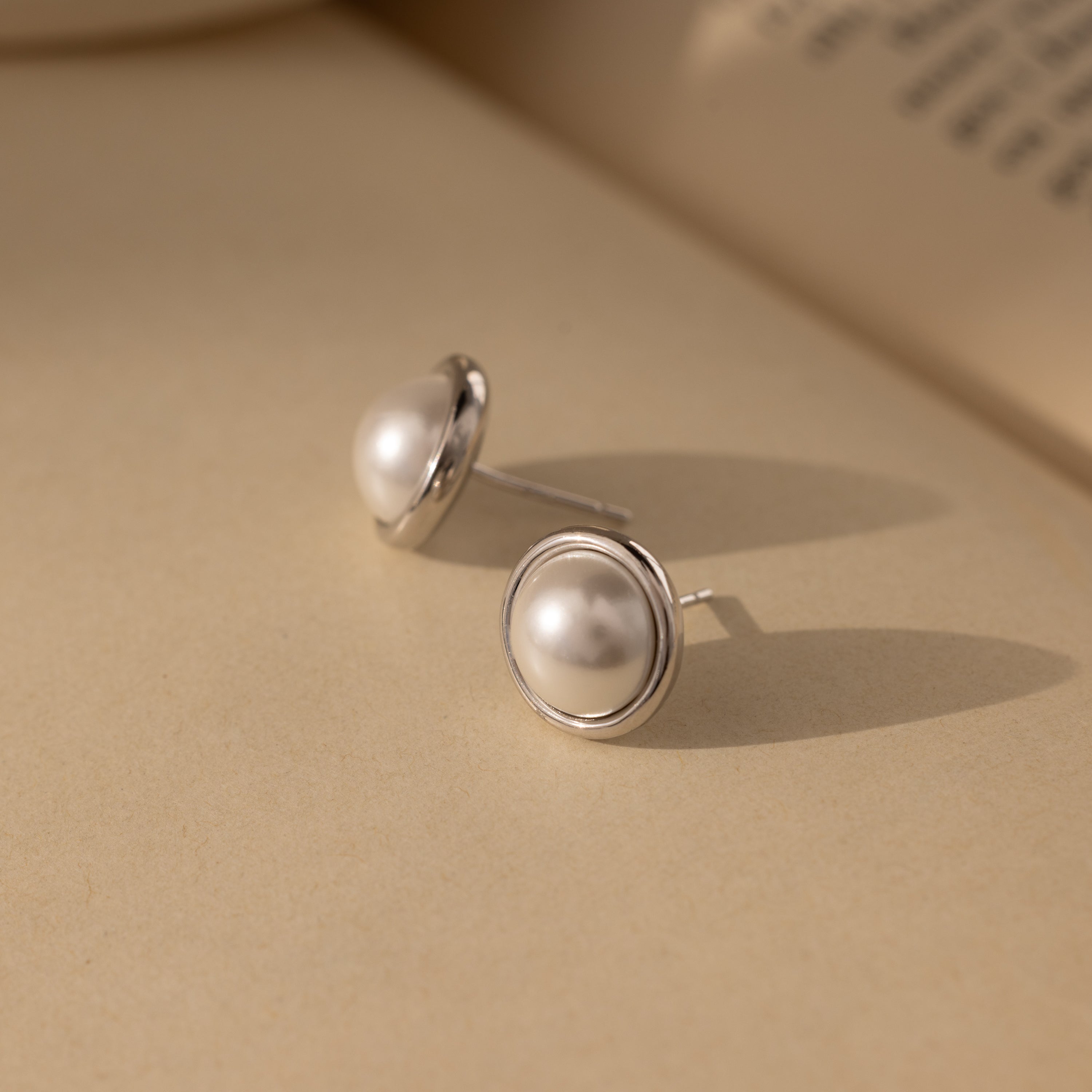 Pearl Bezel Studs
